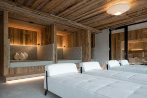 Postel nebo postele na pokoji v ubytování Hotel Dorfer