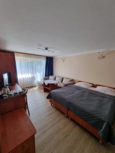 Posteľ alebo postele v izbe v ubytovaní Gościniec pod Polną Różą 2