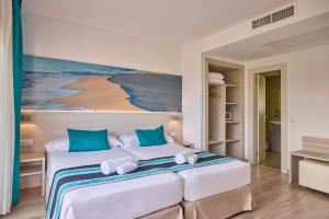 Postel nebo postele na pokoji v ubytování Welikehotel Fenix