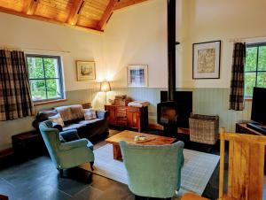 Televiisor ja/või meelelahutuskeskus majutusasutuses Logies Croft