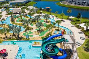 an image of a water park at a resort at Stylish 4BR Resort Home with Private Pool & Fun Themed Rooms Near Disney in Kissimmee