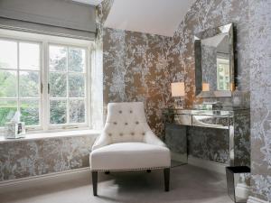 Posezení v ubytování Garden Cottage