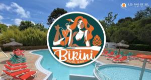 a sign in front of a swimming pool with chairs at Camping Les Pins de Sel in Saint-Augustin +87 photos