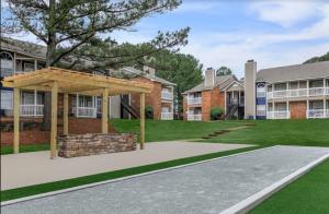 a large house with a pavilion in front of it at The Davis 1824 I Spacious 2 Bed 2 Bath in Huntsville