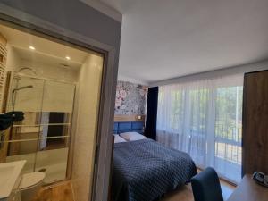 Kúpeľňa v ubytovaní Gościniec pod Polną Różą 2