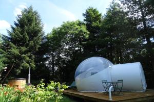 Taman di luar La Parenthèse Insolite, bulle avec bain nordique +11 gambar