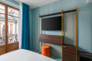 Cama ou camas em um quarto em Marmont Hotel