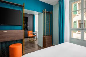 Cama ou camas em um quarto em Marmont Hotel