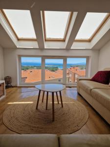 Predel za sedenje v nastanitvi Apartment Lea