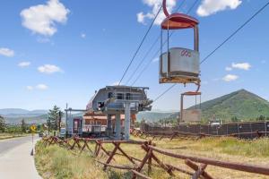 a gondola on a cable car in a field at Modern Mountain Escape at Blackstone Walk to the Slopes in Park City