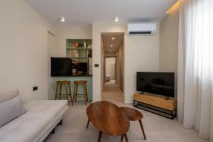 TV a/nebo společenská místnost v ubytování Sokaki Alley Houses