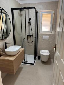 Kúpeľňa v ubytovaní Apartments Marta - Zadar - near the sea + 37 fotografií
