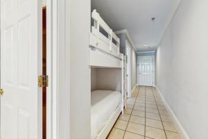 Postel nebo postele na pokoji v ubytování Windancer Condominiums