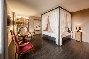 Postel nebo postele na pokoji v ubytování Hotel Greuterhof Islikon