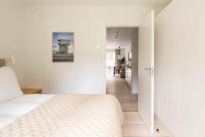 Ένα ή περισσότερα κρεβάτια σε δωμάτιο στο Beautiful Bright Apartments in Carlsbergbyen
