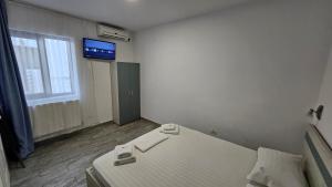 Postel nebo postele na pokoji v ubytování Vila duMio