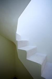 En eller flere senge i et værelse på Can Agata