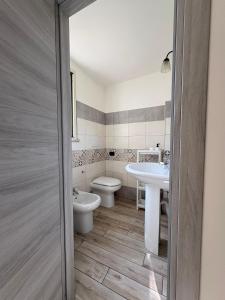 Koupelna v ubytování Alloggio Turistico LQ + 15 fotografií