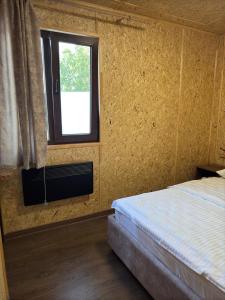 Letto o letti in una camera di Hayots Ojakh