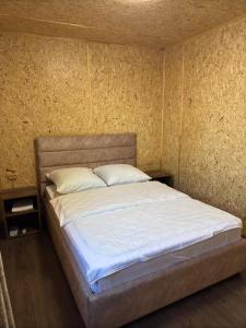Postel nebo postele na pokoji v ubytování Hayots Ojakh