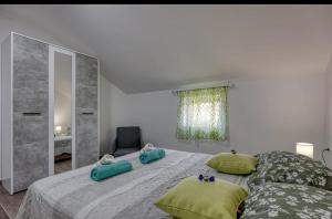 Postel nebo postele na pokoji v ubytování App Bonić