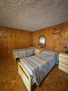 Ένα ή περισσότερα κρεβάτια σε δωμάτιο στο Aura House