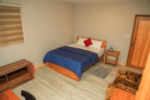 Ένα ή περισσότερα κρεβάτια σε δωμάτιο στο Mount Star Villas +3 φωτογραφίες