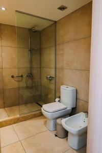 Um banheiro em Plaza Paradiso Petit Hotel