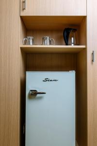 A cozinha ou cozinha compacta de Plaza Paradiso Petit Hotel