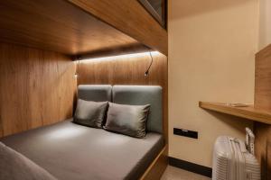 Postel nebo postele na pokoji v ubytování Sleepover - Lima Airport