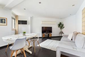 TV a/nebo společenská místnost v ubytování Apartamento - Parque do Jamor