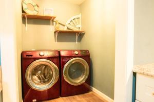 a washer and dryer in a laundry room at Lakefront Texoma Harbor - 33 in Mead