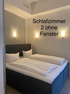 Postel nebo postele na pokoji v ubytování Nikolai Appartements