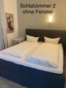 Postel nebo postele na pokoji v ubytování Nikolai Appartements