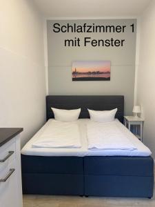 Postel nebo postele na pokoji v ubytování Nikolai Appartements