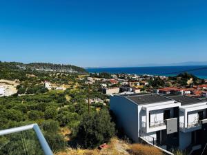 a house with a view of the ocean at Apartment Elias Polychrono in Polychrono