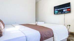 Postel nebo postele na pokoji v ubytování Mediterranean Escape