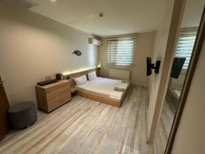 Postel nebo postele na pokoji v ubytování Social House MIL