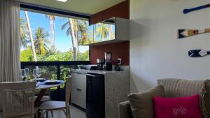 Køkken eller tekøkken på Mar de Campas - Flats a 100m da Praia de Tamandaré por Yolo