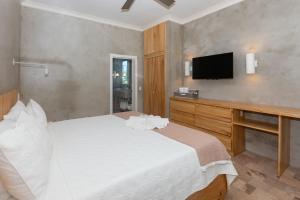 Llit o llits en una habitació de Todo es Posible home