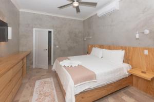 Llit o llits en una habitació de Todo es Posible home