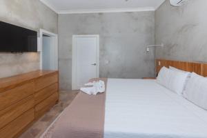 Llit o llits en una habitació de Todo es Posible home