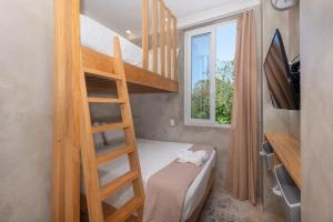 Llit o llits en una habitació de Todo es Posible home