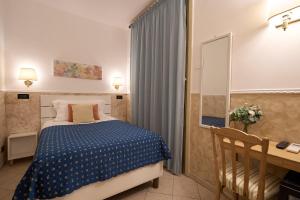 Katil atau katil-katil dalam bilik di Hotel Ascot +60 gambar