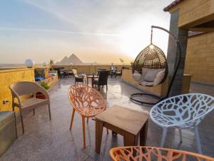 Svalir eða verönd á Gardenia Pyramids View Inn - Rooftop