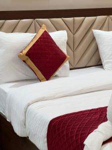 Postel nebo postele na pokoji v ubytování RJ-02 Hotel