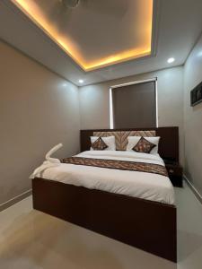 Postel nebo postele na pokoji v ubytování RJ-02 Hotel
