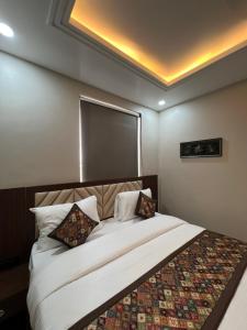 Postel nebo postele na pokoji v ubytování RJ-02 Hotel