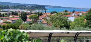 a view of a town with a view of the water at Mike1890 in Portorož