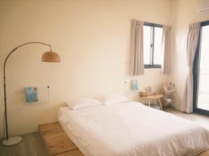 Postel nebo postele na pokoji v ubytování Lunos homestay